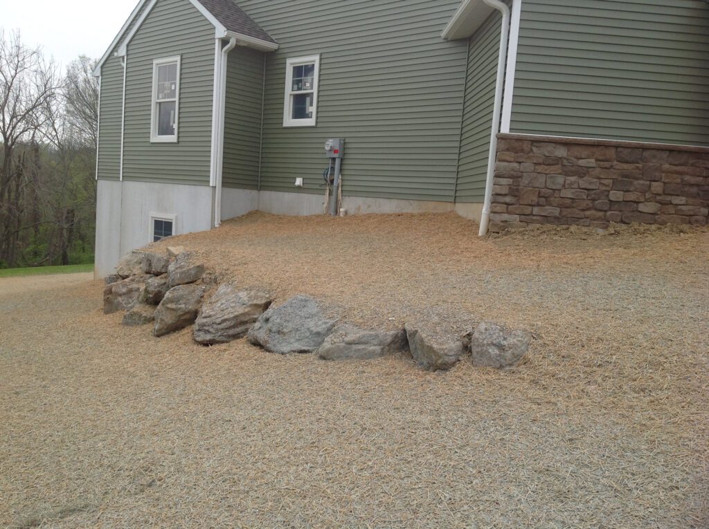 Boulder Planting Bed Before