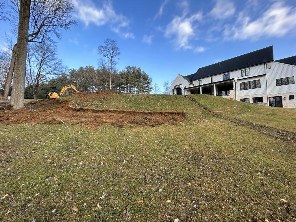 Hillside Retaining Wall Before
